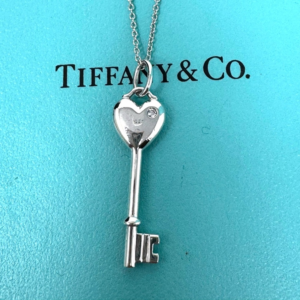 Authentic Tiffany & Co 1P Diamond Heart Key Pendant Necklace.